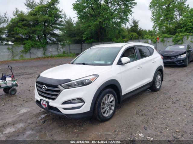 Photo 5 VIN: KM8J3CA44GU062823 - HYUNDAI TUCSON 