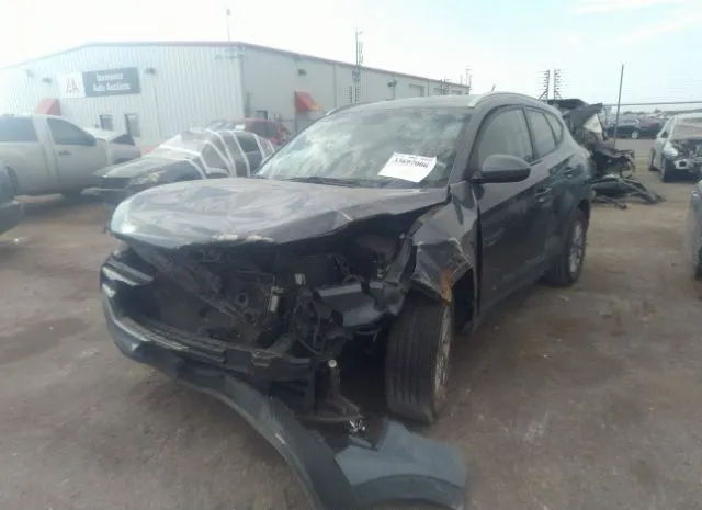 Photo 5 VIN: KM8J3CA44GU097703 - HYUNDAI TUCSON 