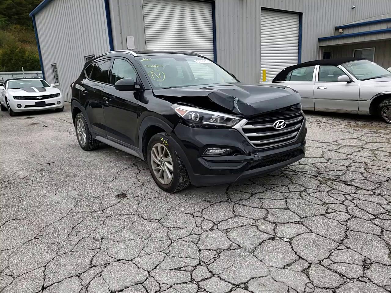 Photo 10 VIN: KM8J3CA44JU700415 - HYUNDAI TUCSON 