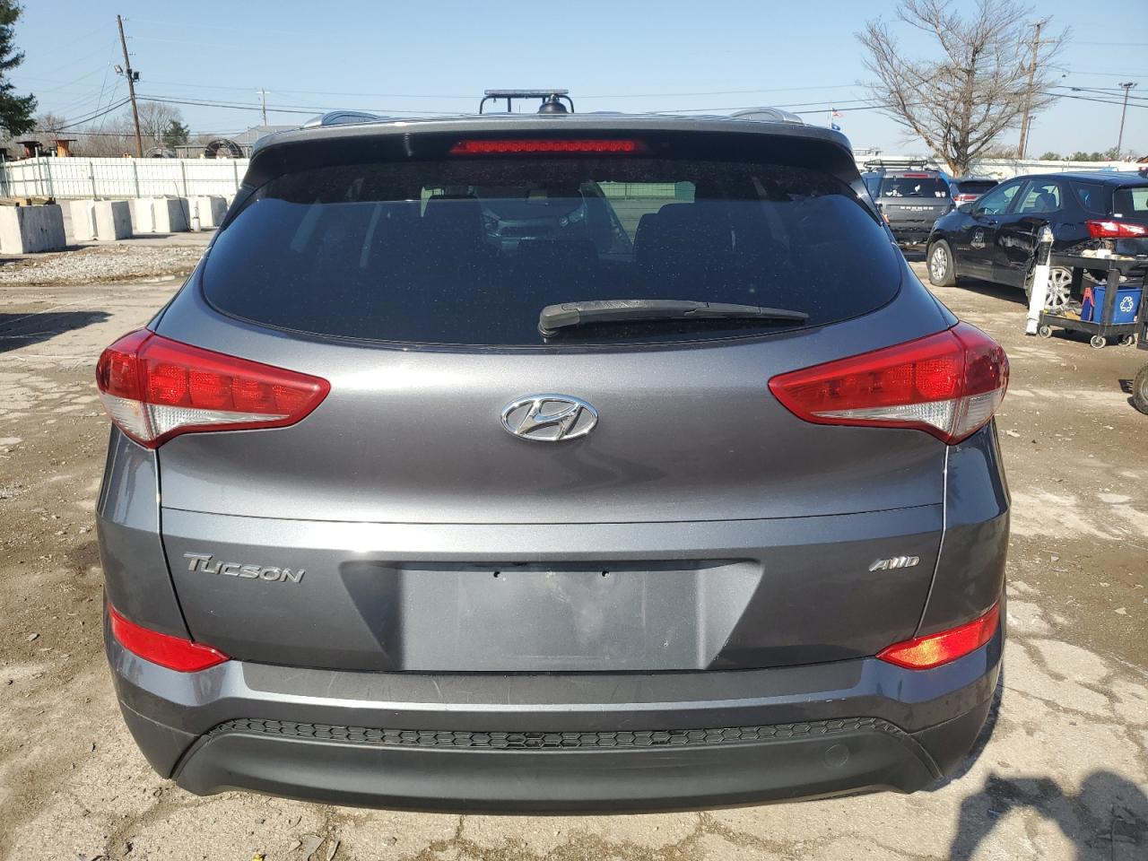 Photo 5 VIN: KM8J3CA45GU041320 - HYUNDAI TUCSON 