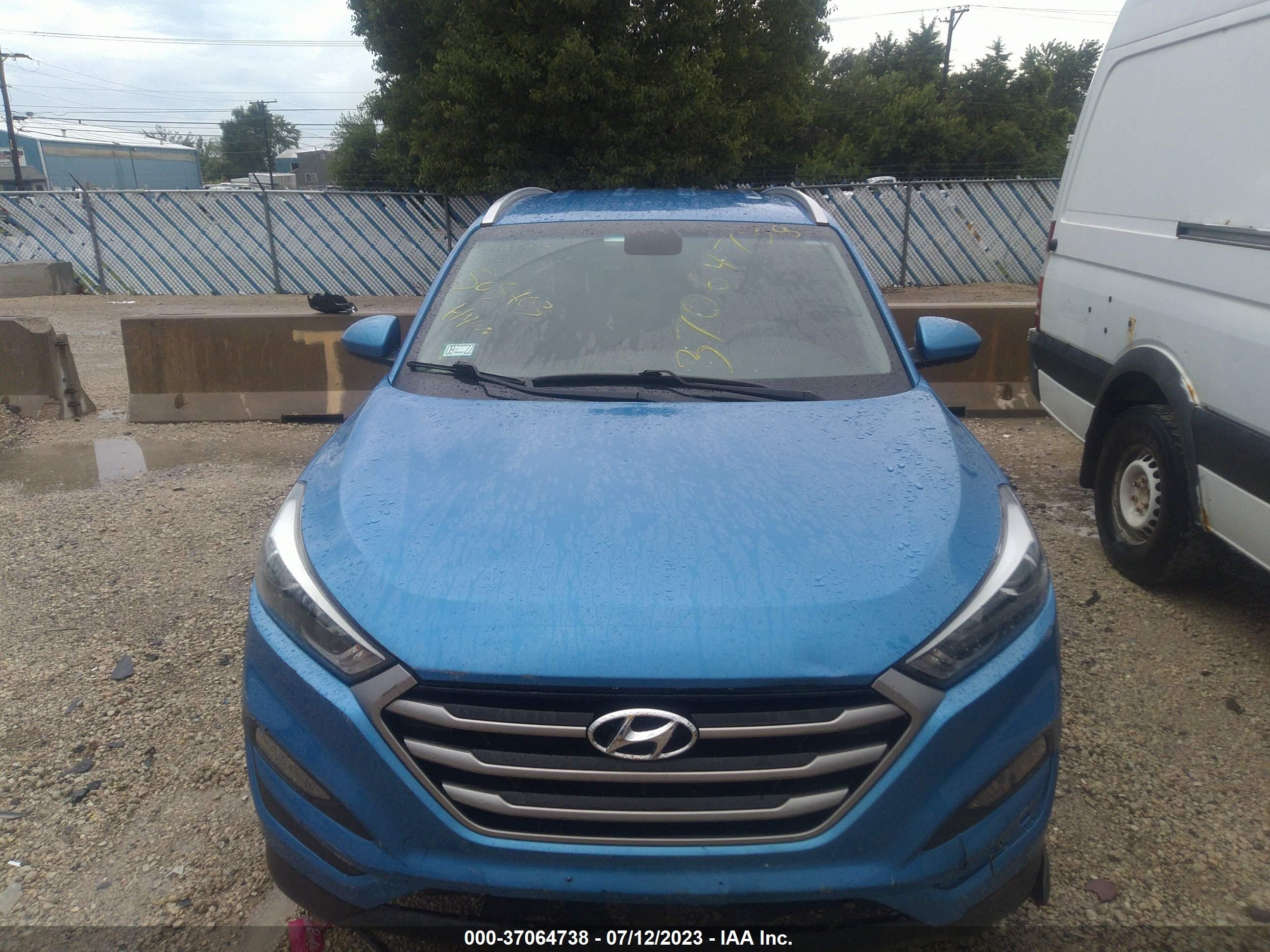 Photo 11 VIN: KM8J3CA46HU302567 - HYUNDAI TUCSON 