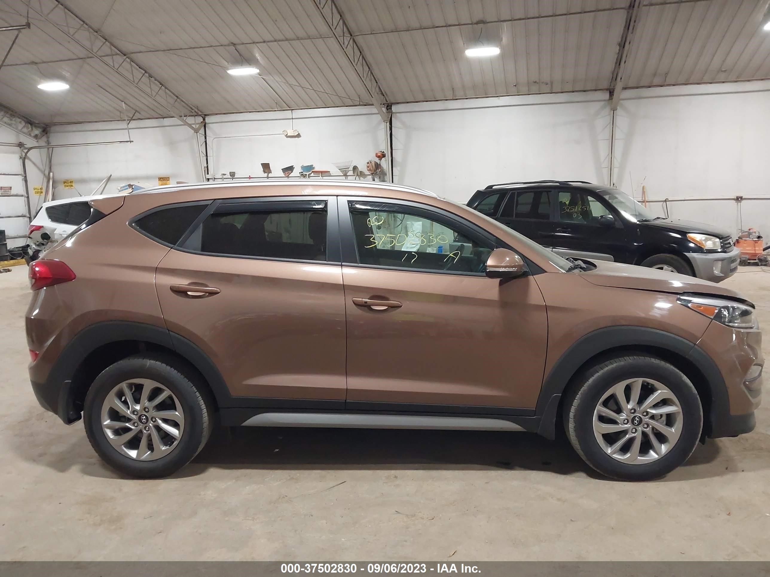 Photo 12 VIN: KM8J3CA46HU439699 - HYUNDAI TUCSON 