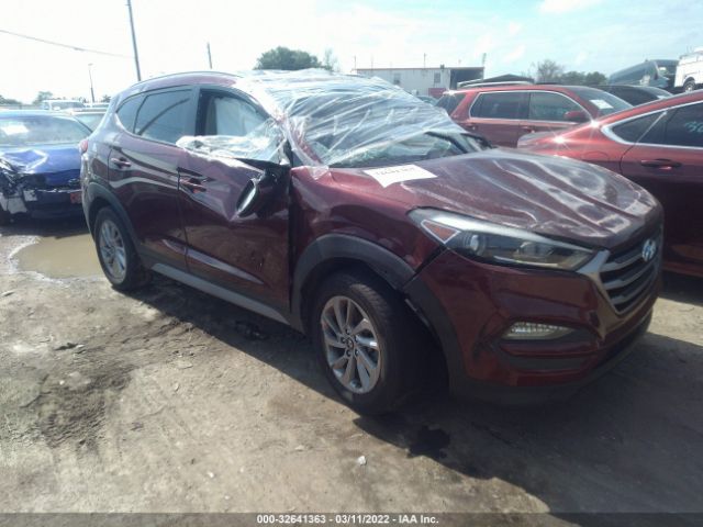 Photo 0 VIN: KM8J3CA46JU599183 - HYUNDAI TUCSON 