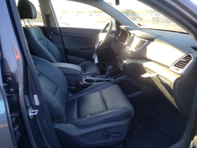 Photo 4 VIN: KM8J3CA46JU735828 - HYUNDAI TUCSON 