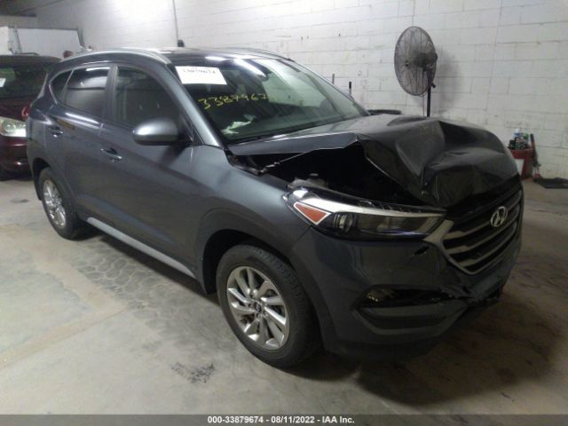 Photo 0 VIN: KM8J3CA46JU755660 - HYUNDAI TUCSON 