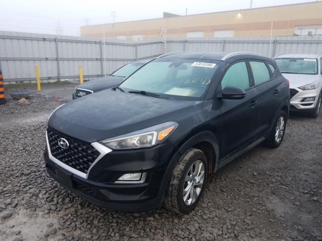 Photo 1 VIN: KM8J3CA46KU877906 - HYUNDAI TUCSON LIM 