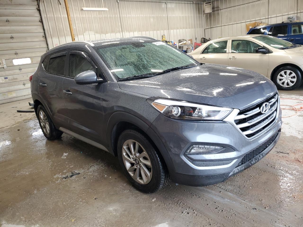 Photo 3 VIN: KM8J3CA47JU603130 - HYUNDAI TUCSON 