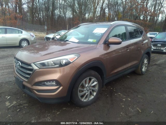 Photo 1 VIN: KM8J3CA48GU039867 - HYUNDAI TUCSON 