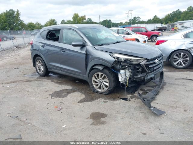 Photo 0 VIN: KM8J3CA49GU037030 - HYUNDAI TUCSON 