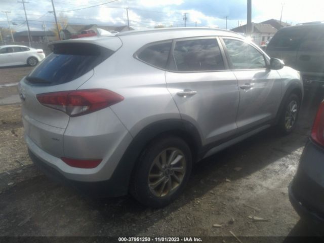 Photo 3 VIN: KM8J3CA49JU604070 - HYUNDAI TUCSON 