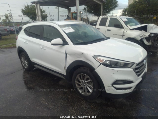 Photo 0 VIN: KM8J3CA49JU615585 - HYUNDAI TUCSON 