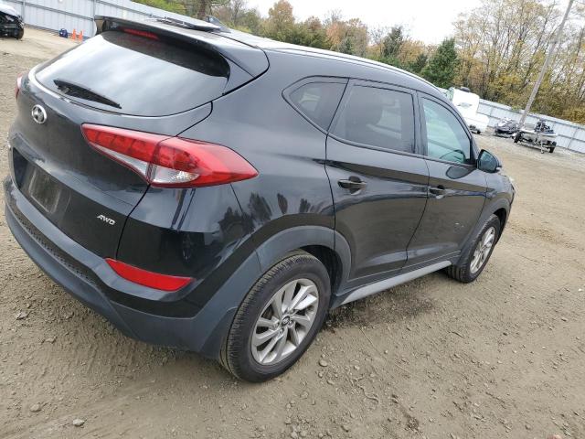 Photo 2 VIN: KM8J3CA49JU767172 - HYUNDAI TUCSON 