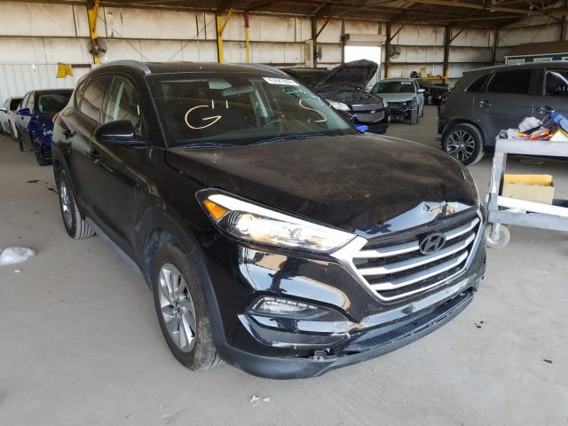 Photo 0 VIN: KM8J3CA49JU767639 - HYUNDAI TUCSON SEL 