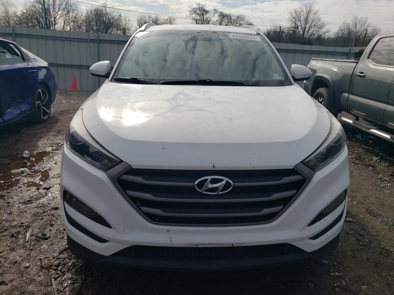 Photo 4 VIN: KM8J3CA4XGU022214 - HYUNDAI TUCSON 