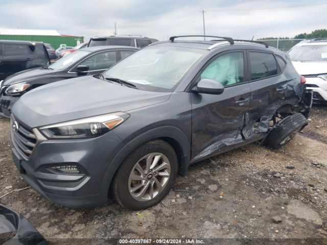 Photo 1 VIN: KM8J3CA4XGU197451 - HYUNDAI TUCSON 