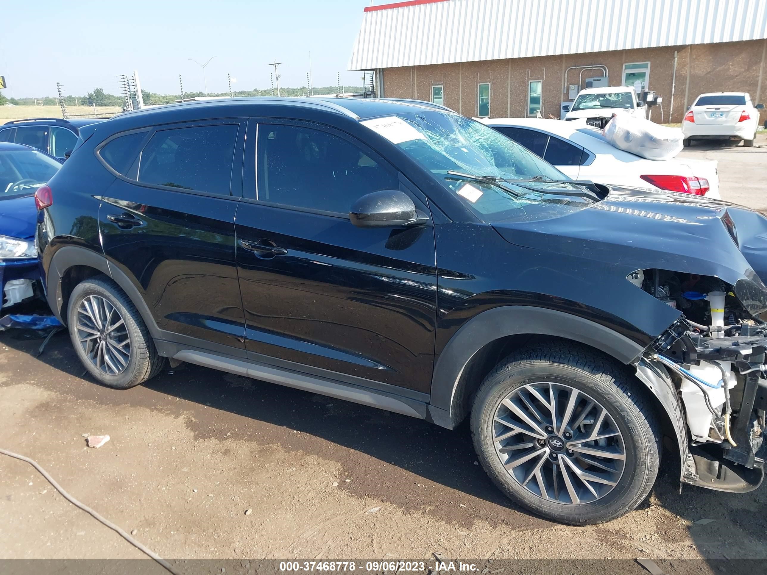 Photo 12 VIN: KM8J3CAL9MU352106 - HYUNDAI TUCSON 