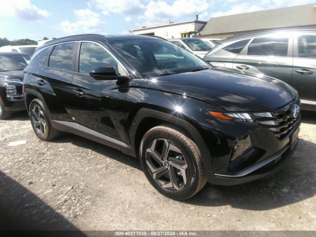 Photo 0 VIN: KM8JBDD21RU234800 - HYUNDAI TUCSON 