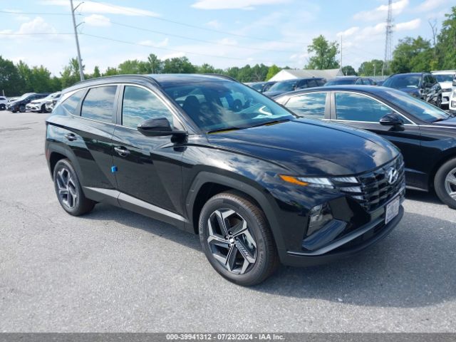 Photo 0 VIN: KM8JBDD24RU221670 - HYUNDAI TUCSON 