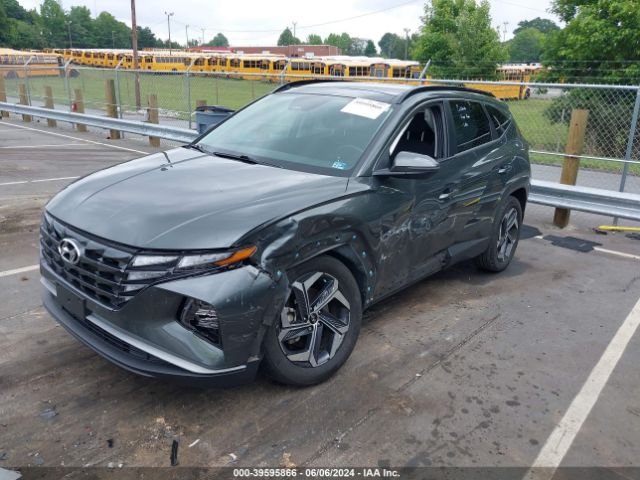 Photo 1 VIN: KM8JFCA12NU053998 - HYUNDAI TUCSON HYBRID 