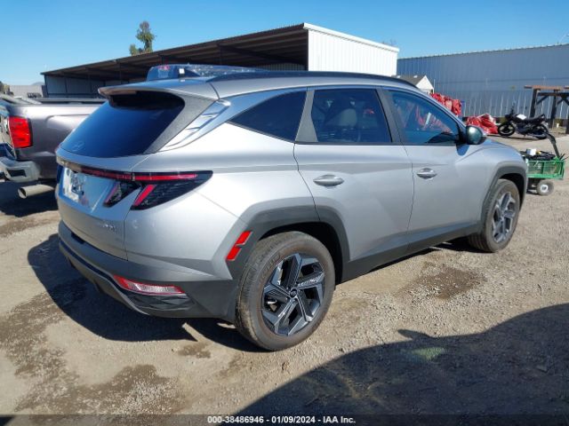 Photo 3 VIN: KM8JFCA1XPU119619 - HYUNDAI TUCSON HYBRID 