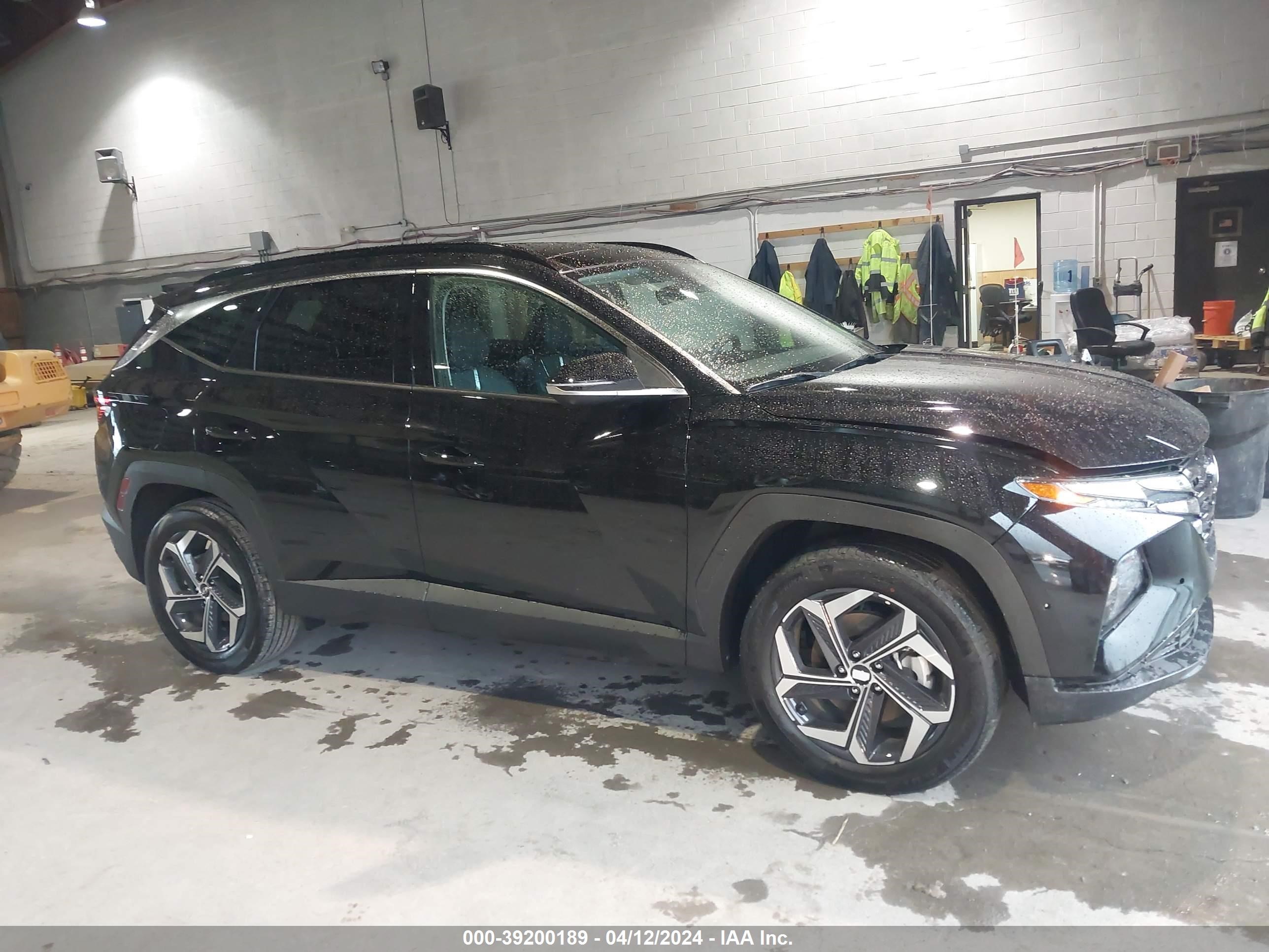 Photo 12 VIN: KM8JFDD23RU159702 - HYUNDAI TUCSON 