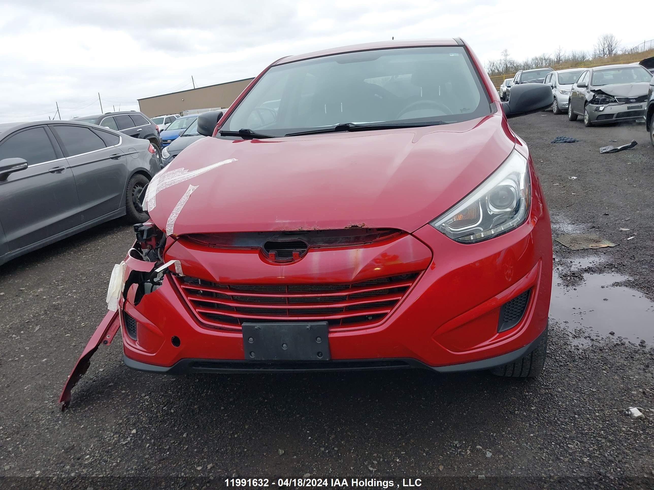 Photo 12 VIN: KM8JTCAF7EU811404 - HYUNDAI TUCSON 