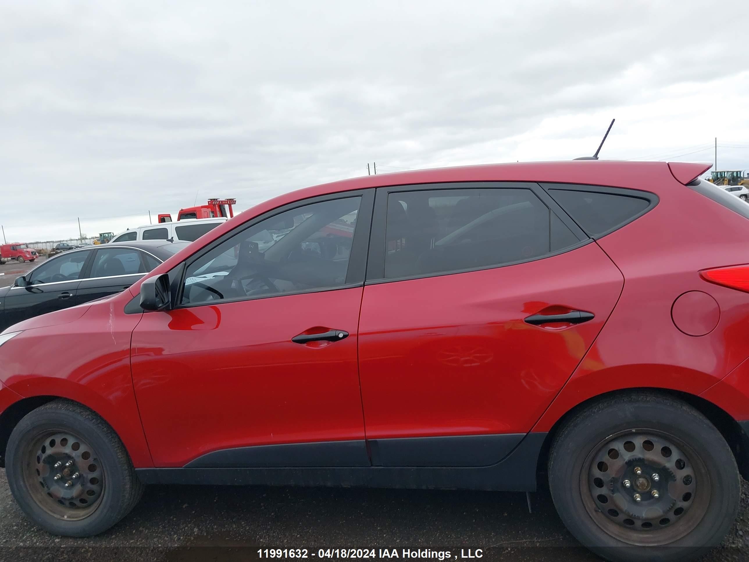 Photo 14 VIN: KM8JTCAF7EU811404 - HYUNDAI TUCSON 