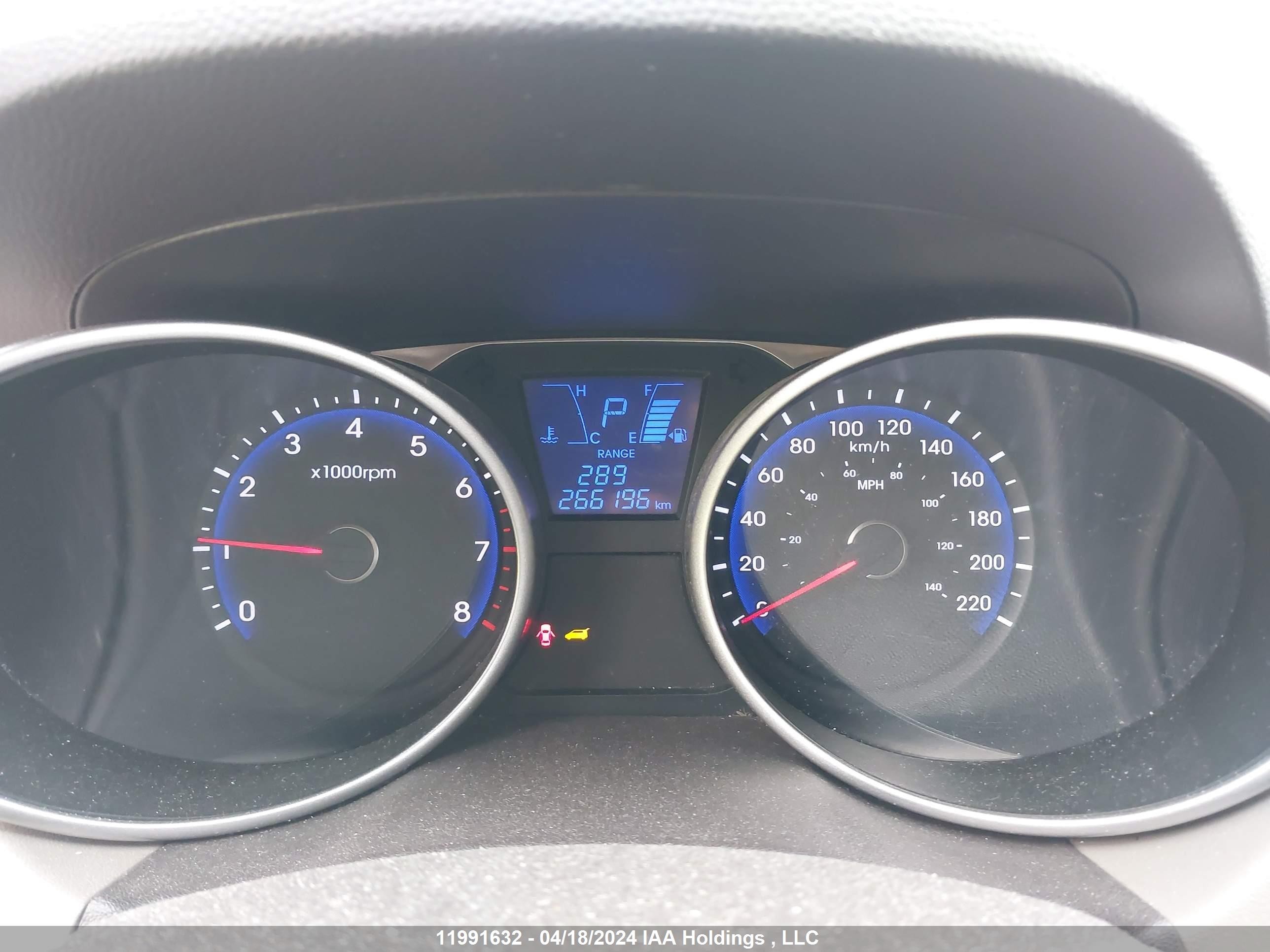 Photo 6 VIN: KM8JTCAF7EU811404 - HYUNDAI TUCSON 