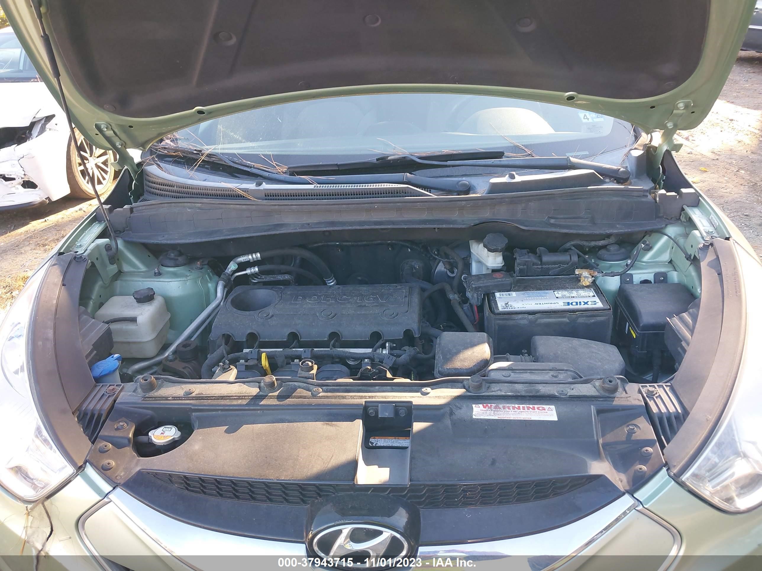 Photo 9 VIN: KM8JU3AC0BU244323 - HYUNDAI TUCSON 