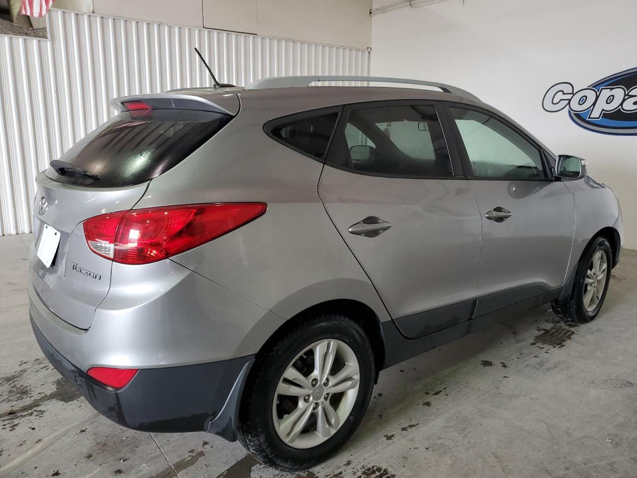 Photo 2 VIN: KM8JU3AC0DU560419 - HYUNDAI TUCSON 