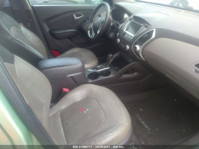 Photo 4 VIN: KM8JU3AC2BU220699 - HYUNDAI TUCSON 