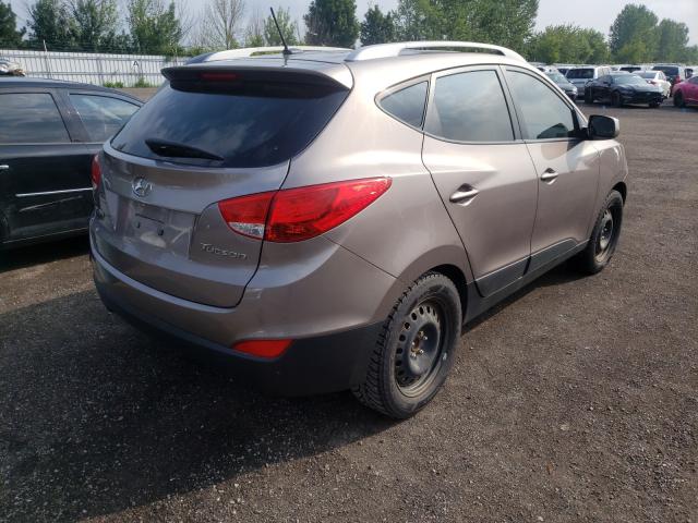 Photo 3 VIN: KM8JU3AC3CU433940 - HYUNDAI TUCSON GLS 