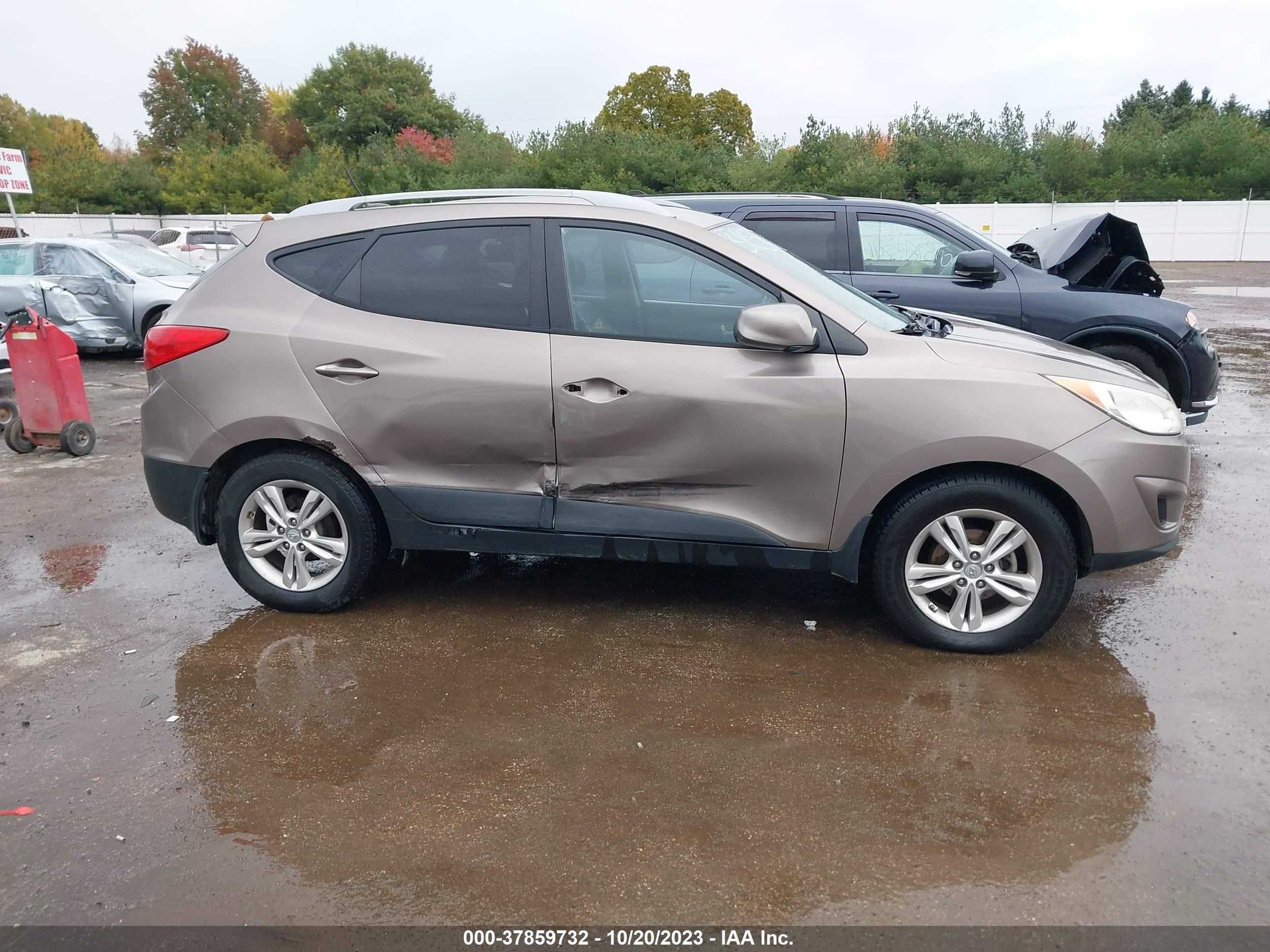 Photo 12 VIN: KM8JU3AC4AU070576 - HYUNDAI TUCSON 