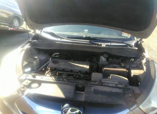 Photo 9 VIN: KM8JU3AC4BU223863 - HYUNDAI TUCSON 