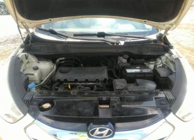 Photo 9 VIN: KM8JU3AC5BU188556 - HYUNDAI TUCSON 