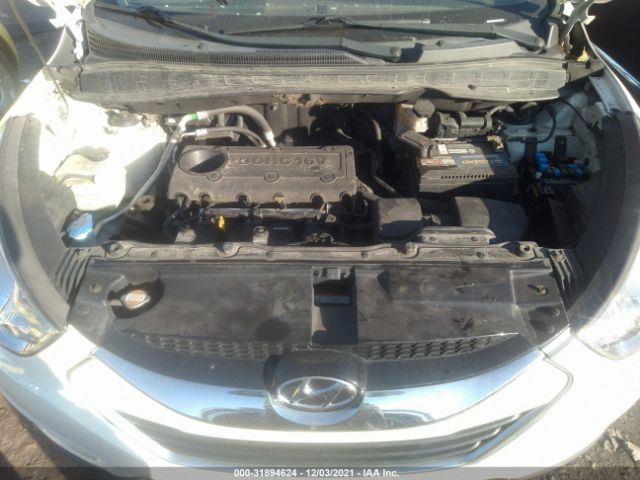 Photo 9 VIN: KM8JU3AC5CU403483 - HYUNDAI TUCSON 