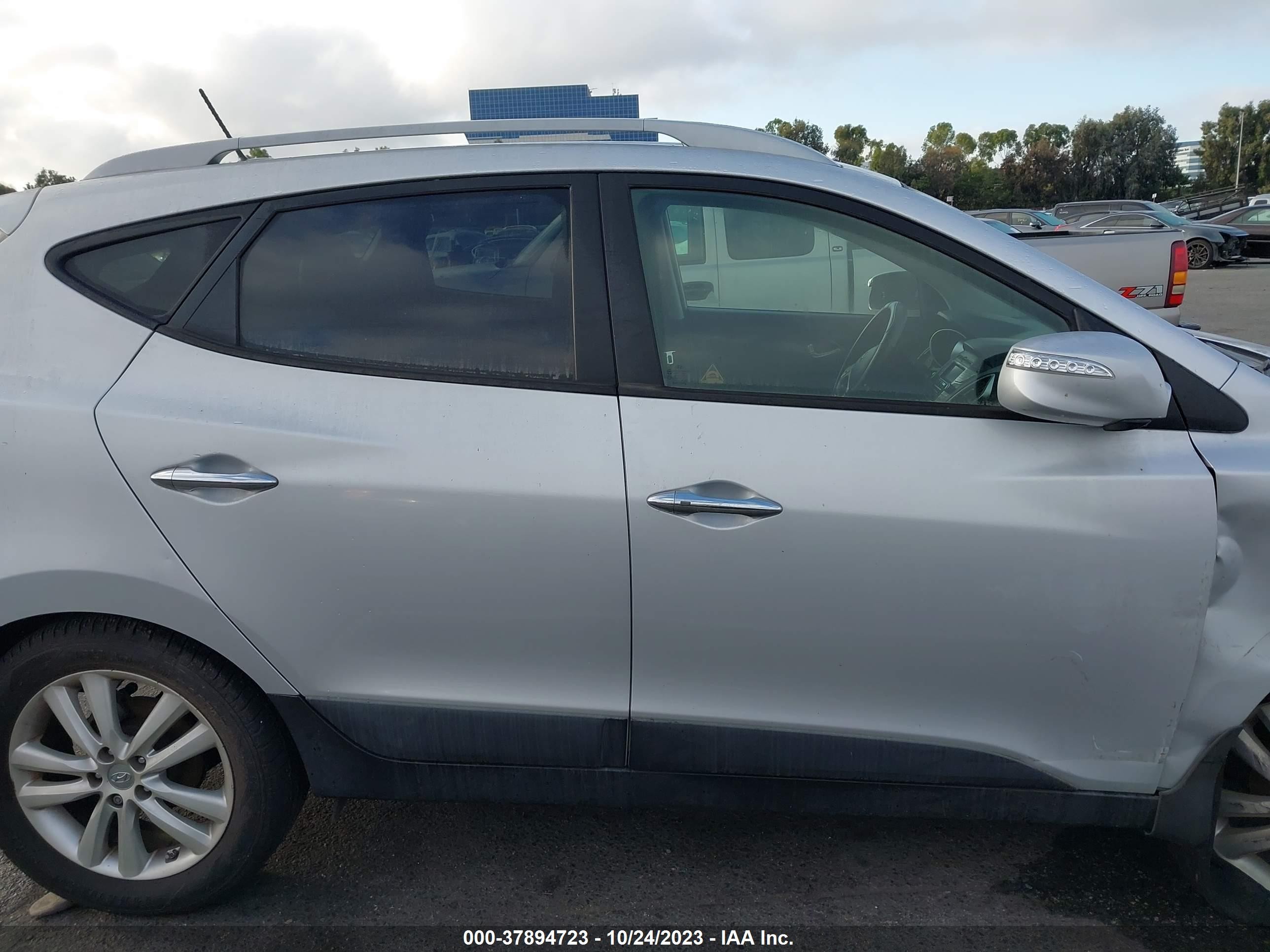 Photo 12 VIN: KM8JU3ACXDU736747 - HYUNDAI TUCSON 