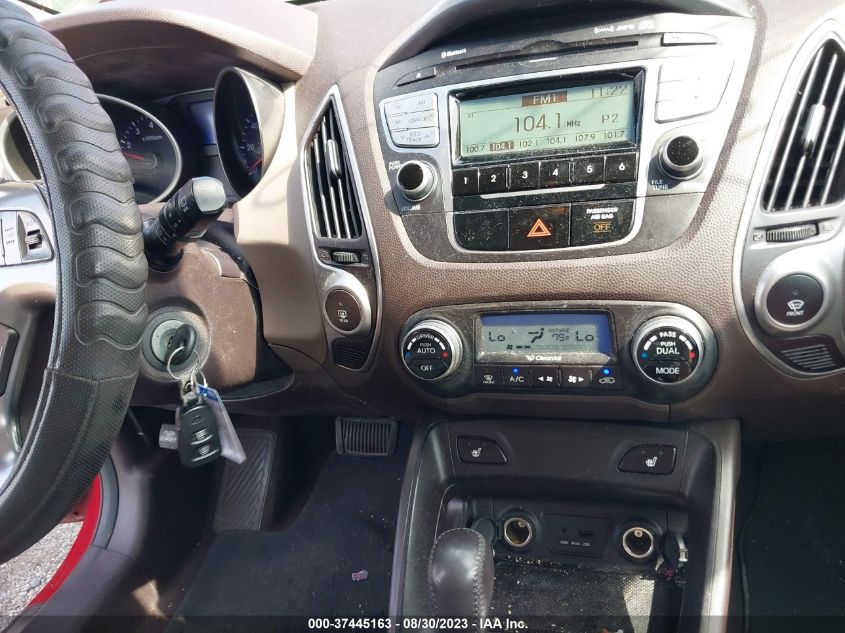 Photo 10 VIN: KM8JUCAC0BU311891 - HYUNDAI TUCSON 