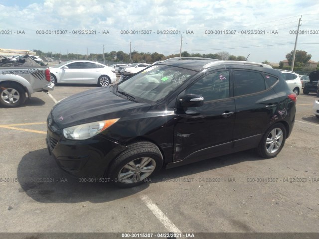 Photo 5 VIN: KM8JUCAC0CU402354 - HYUNDAI TUCSON 