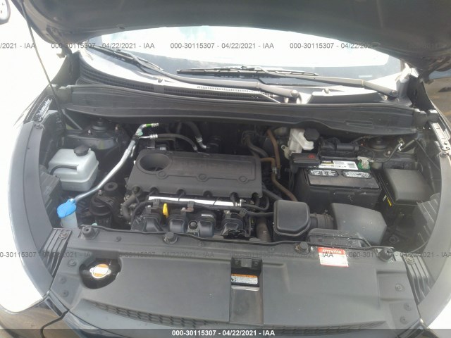 Photo 9 VIN: KM8JUCAC0CU402354 - HYUNDAI TUCSON 