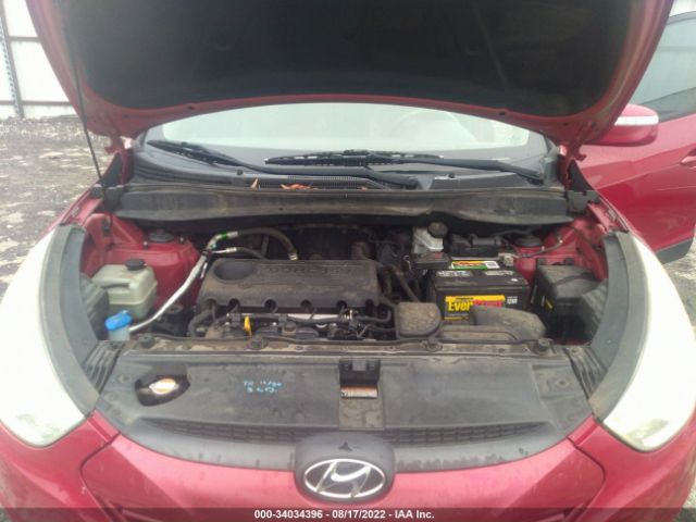 Photo 9 VIN: KM8JUCAC0CU489642 - HYUNDAI TUCSON 