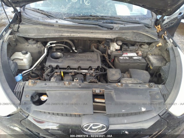 Photo 9 VIN: KM8JUCAC1BU309437 - HYUNDAI TUCSON 