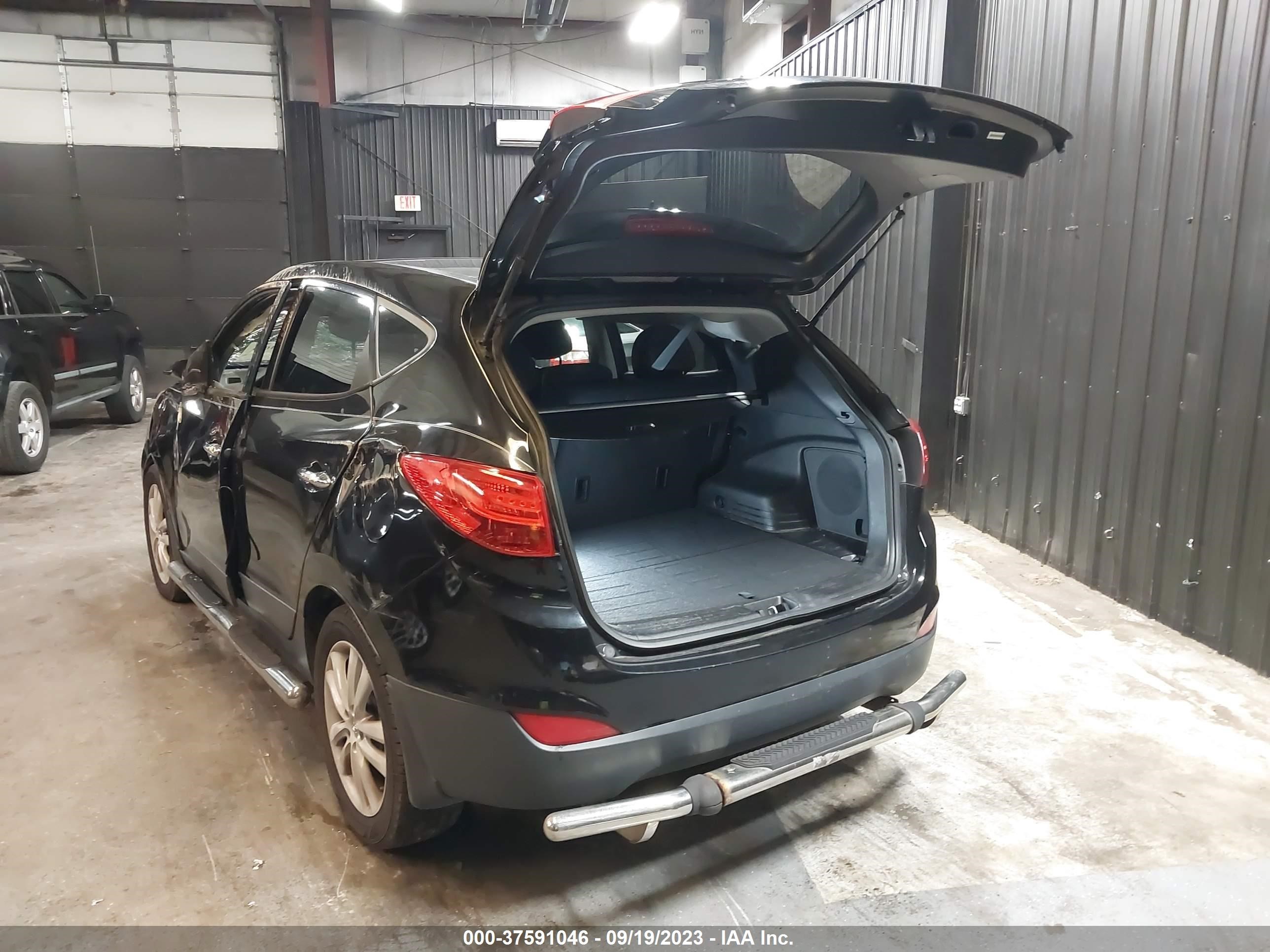 Photo 2 VIN: KM8JUCAC2DU724639 - HYUNDAI TUCSON 