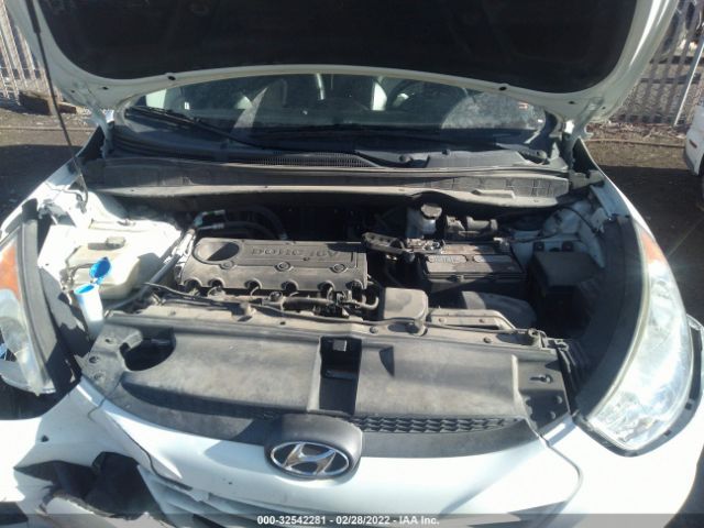 Photo 9 VIN: KM8JUCAC3CU454187 - HYUNDAI TUCSON 