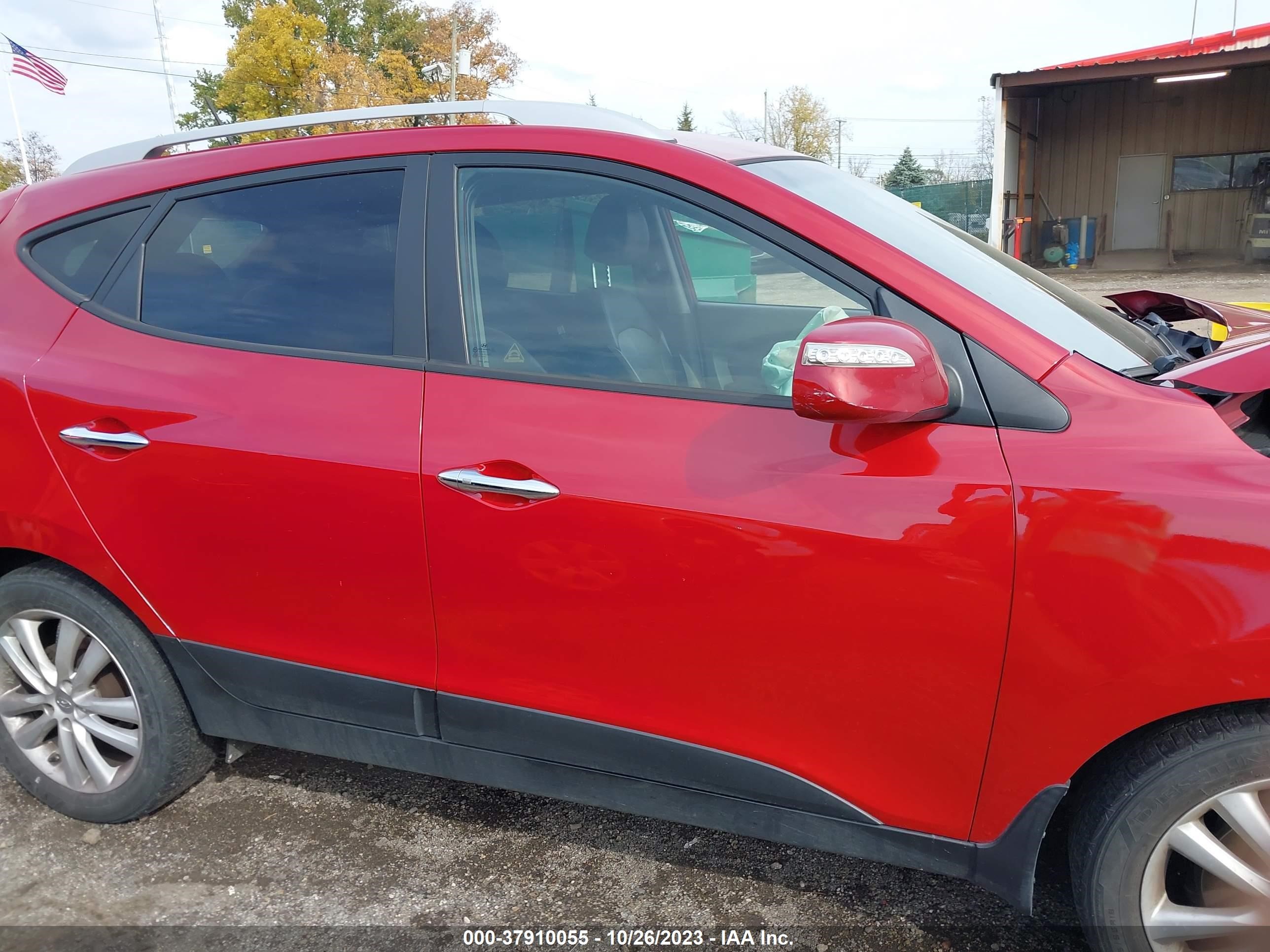 Photo 12 VIN: KM8JUCAC4DU561069 - HYUNDAI TUCSON 