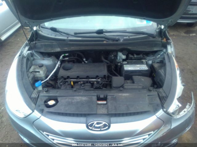 Photo 9 VIN: KM8JUCAC5CU395045 - HYUNDAI TUCSON 