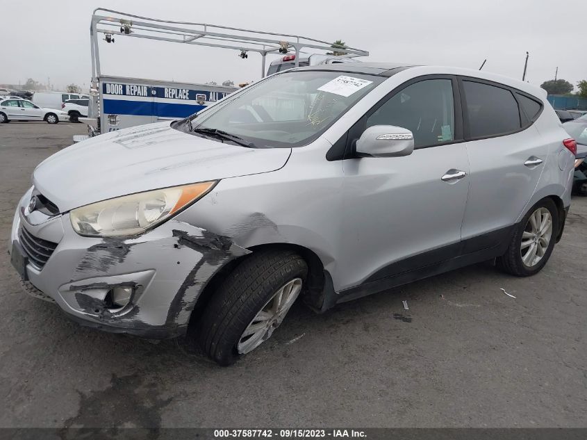 Photo 5 VIN: KM8JUCAC7DU610927 - HYUNDAI TUCSON 