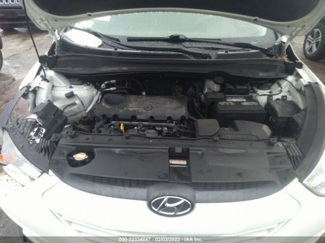 Photo 9 VIN: KM8JUCAC9CU417760 - HYUNDAI TUCSON 