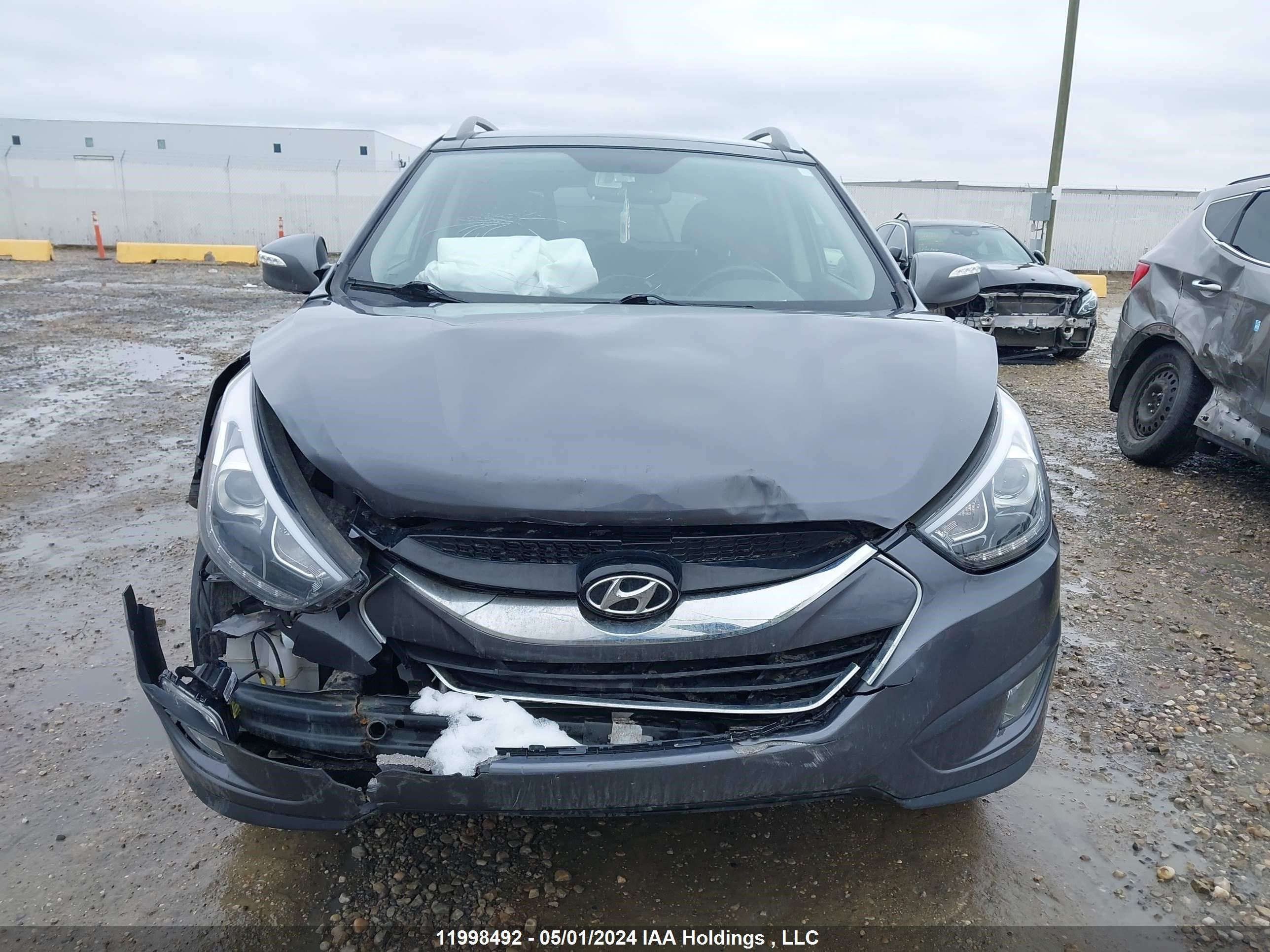 Photo 11 VIN: KM8JUCAG6EU885564 - HYUNDAI TUCSON 