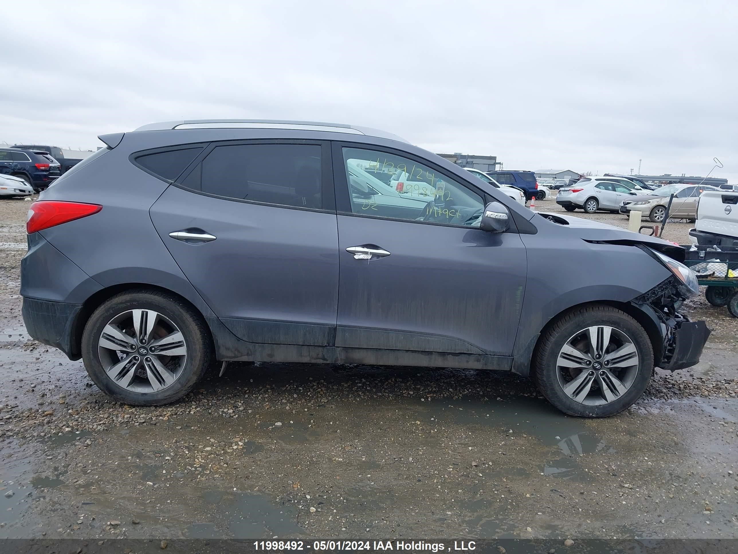 Photo 12 VIN: KM8JUCAG6EU885564 - HYUNDAI TUCSON 